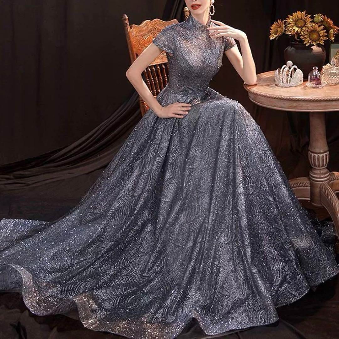 パール付き 煌びやかな生地が美しい 半袖のイブニングドレス パール付き 煌びやかな生地が美しい 半袖のイブニングドレス - メルカリ