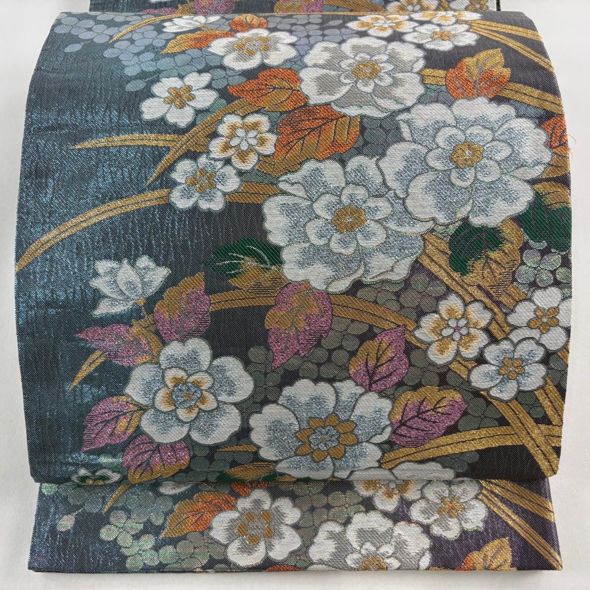 袋帯 秀品 振袖向き 草花 芝 金銀糸 箔 水色 六通 正絹 【中古