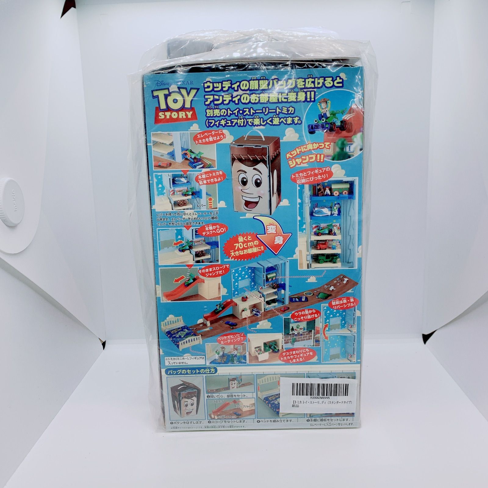 トイ・ストーリー トミカ パノラマバッグ ウッディ Amazon.co.jp