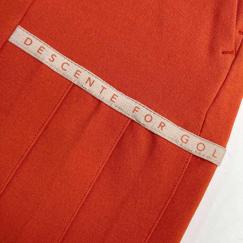 デサントゴルフ DESCENTE GOLF スカート 64 オレンジ系新品タグ付