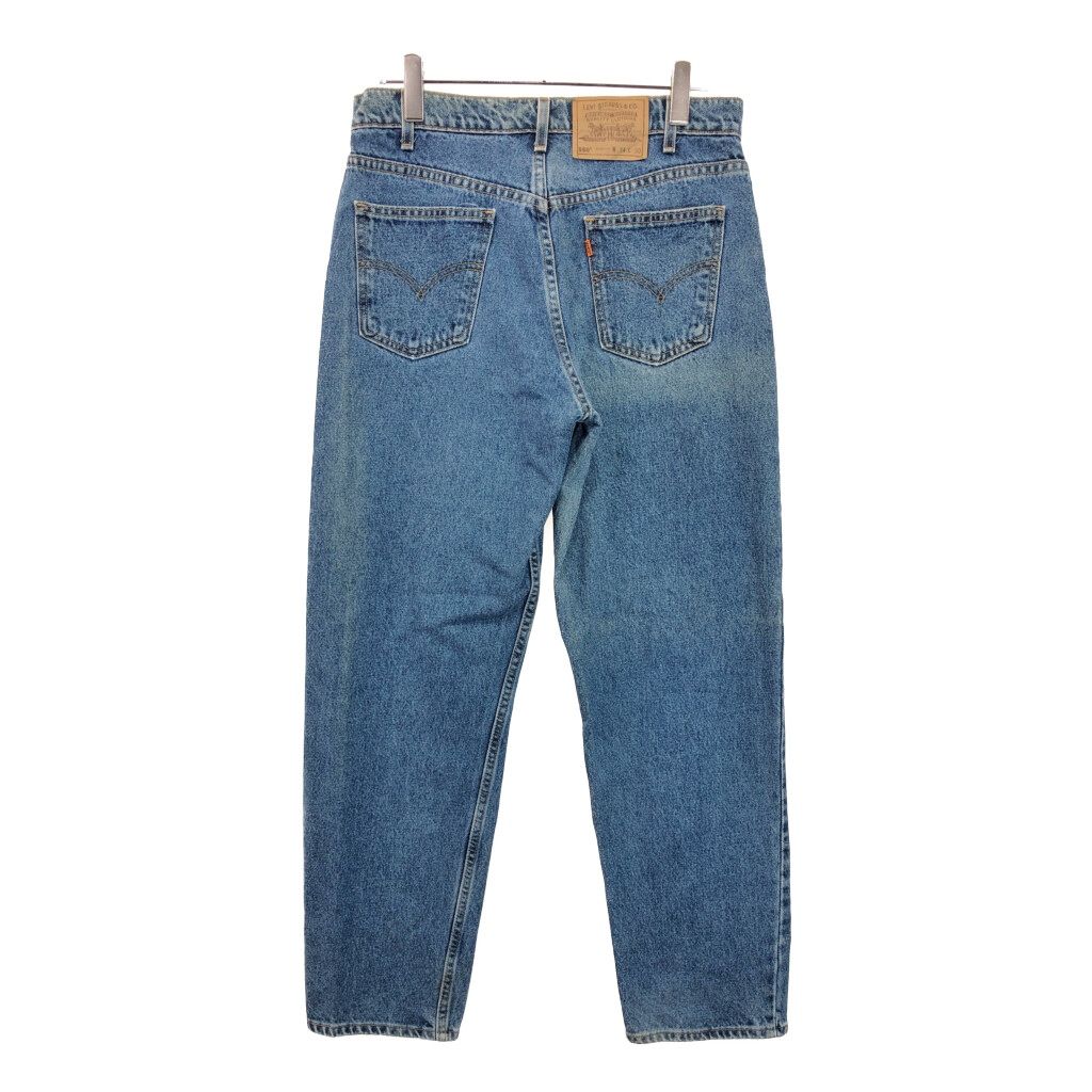 90年代 Levi's リーバイス 550 デニムパンツ オレンジタブ ブルー(メンズ W34 L30)中古 古着 U5368 90年代 Levi's リーバイス 550 デニムパンツ オレンジタブ ブルー
