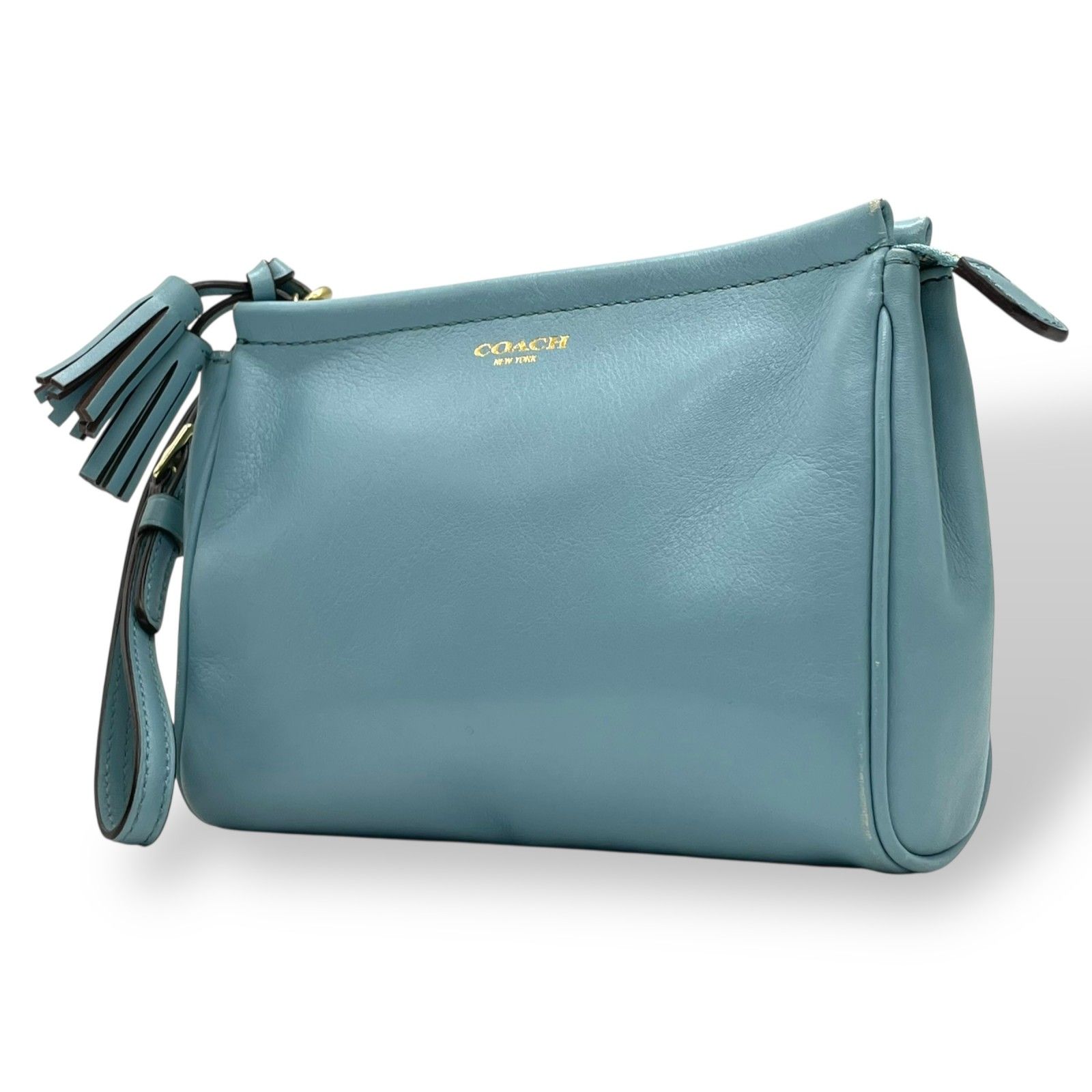 コーチ COACH ポーチ レザー スカイブルー タッセル付き ロゴ 上品 コンパクト 本革 S52