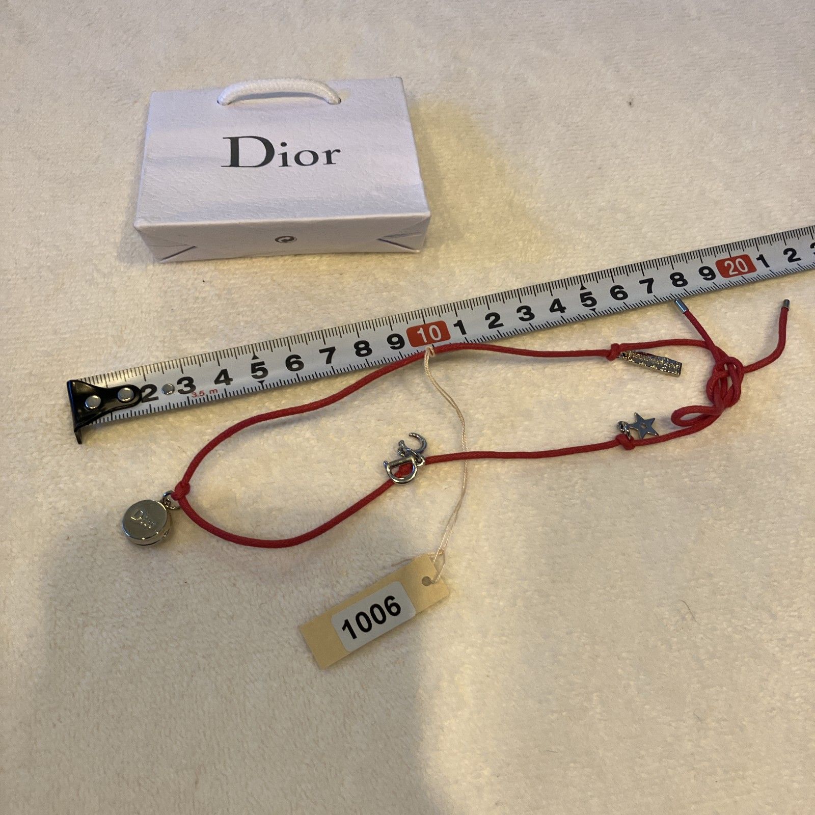 Dior 赤 チャーム付きブレスレット Dior】ノベルティ チャーム付きコードブレスレット 赤 小袋付き