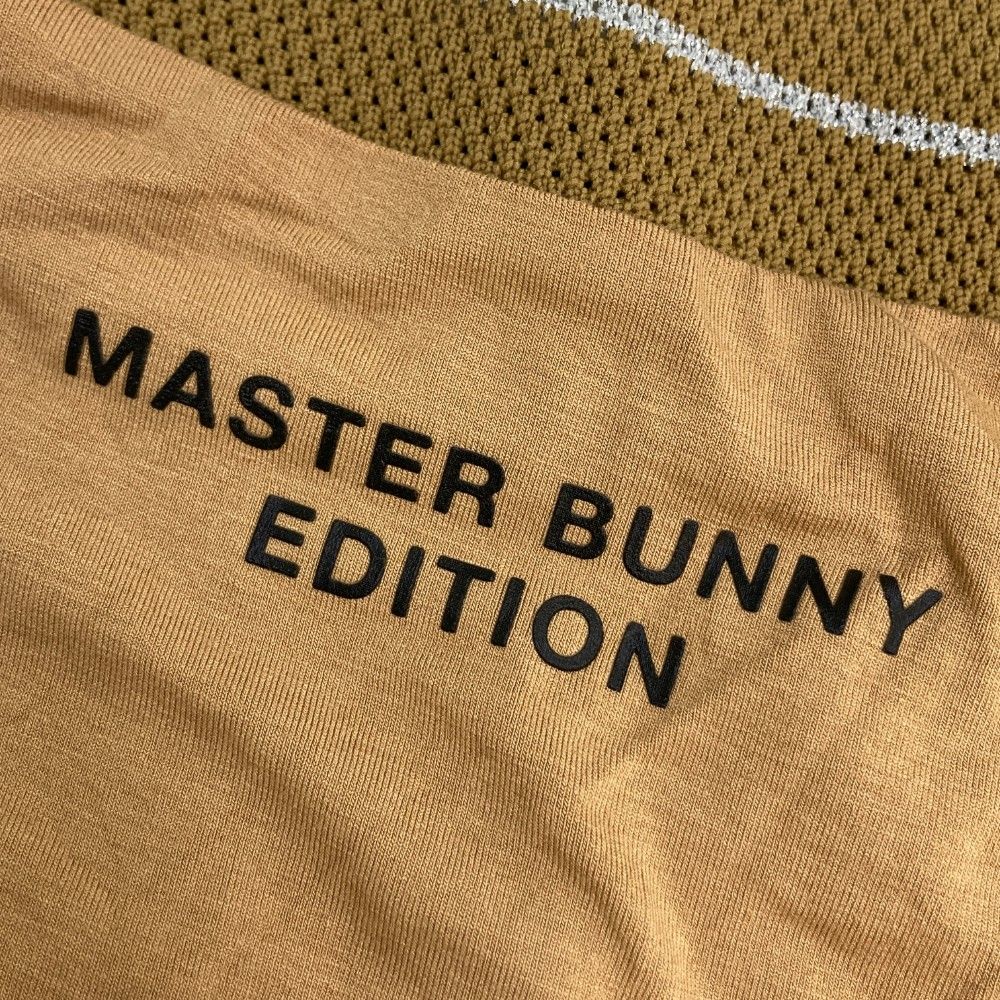 サイズ：0 MASTER BUNNY EDITION マスターバニーエディション 2023年モデル ハイネック 半袖Tシャツ  ブラウン系 [240101457209] ゴルフウェア レディース ストスト MASTER BUNNY EDITION マスターバニーエディション 2023年 半袖