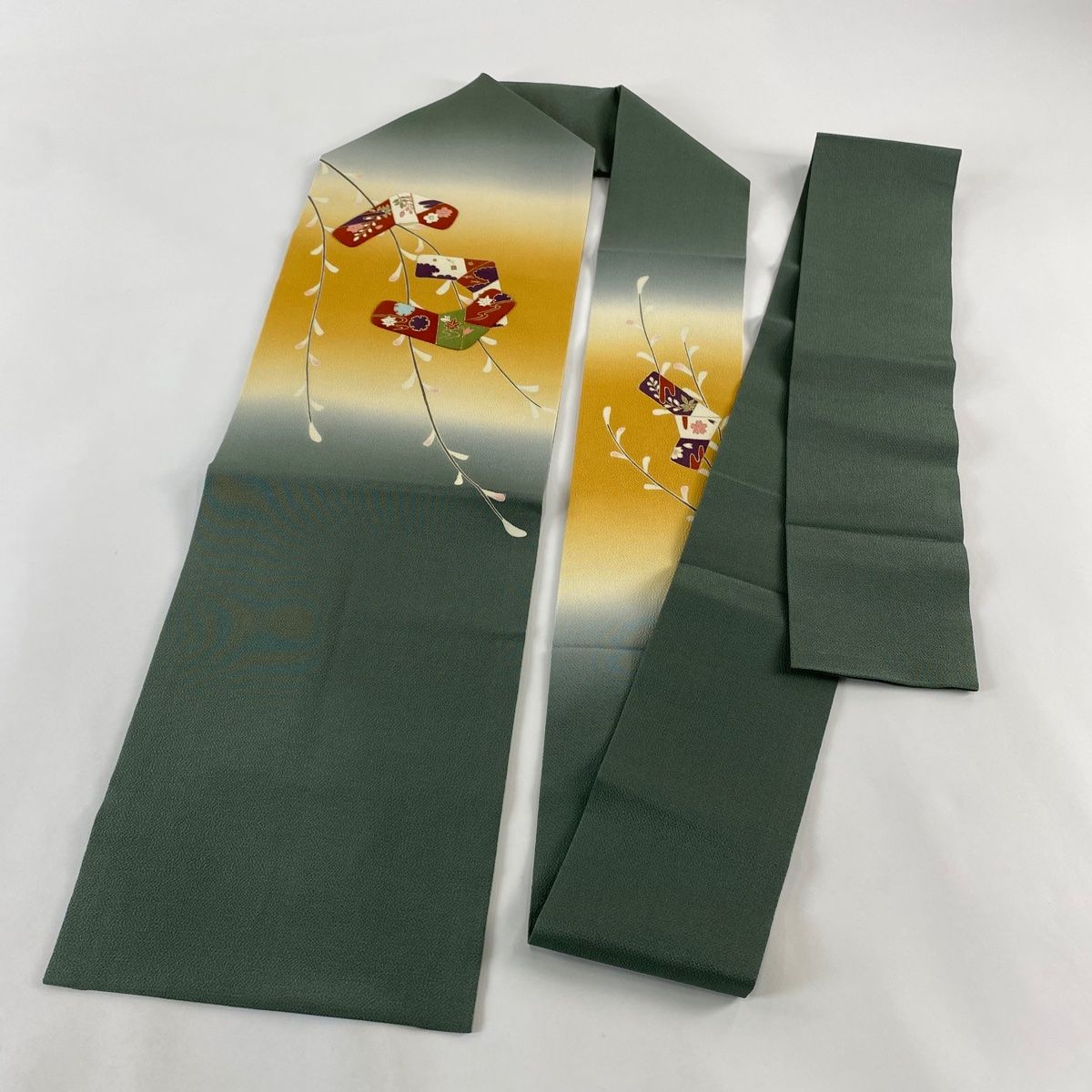 名古屋帯 美品 逸品 ホリヒロシ 落款 草花 雪輪 金糸 金彩 緑
