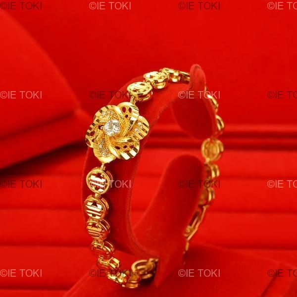 女性の 18K ゴールド象嵌ジルコンブレスレットファッションフラワー幾何学時計チェーン親友 AU750 ギフト券