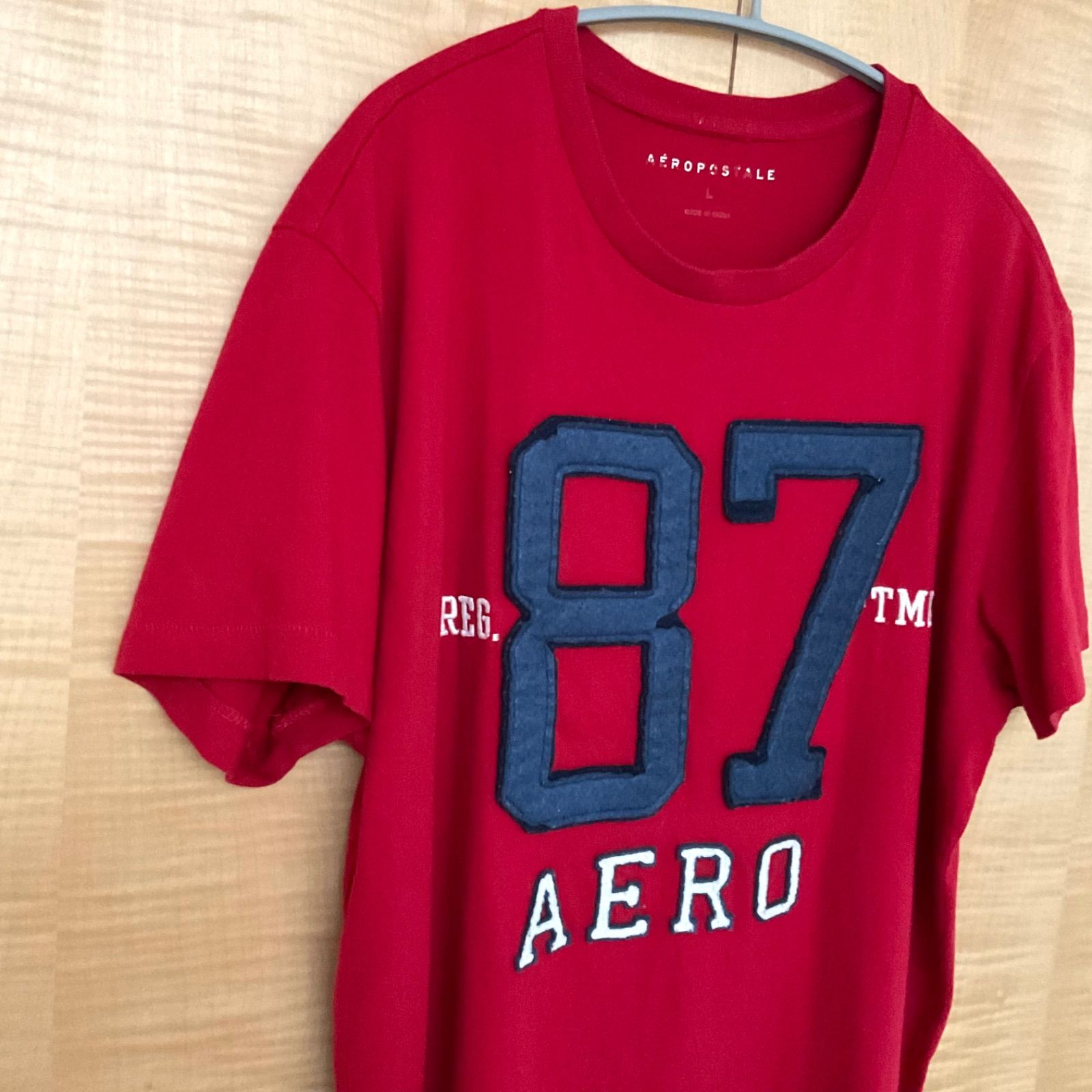 US古着 エアロポステール 87ワッペン テキストプリント 半袖tシャツ赤L