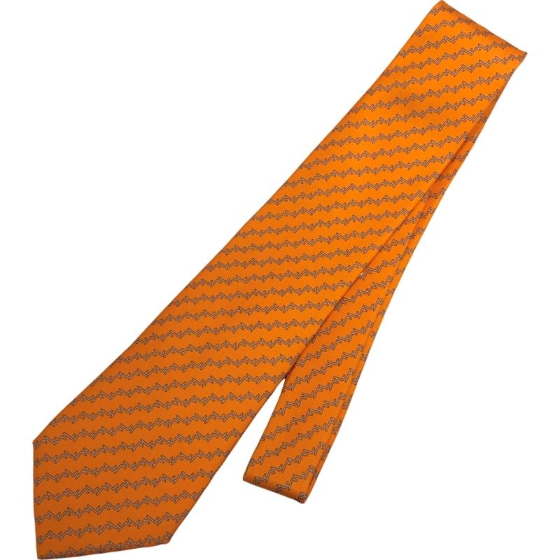 エルメス　ネクタイ　H柄　H総柄　オレンジ　ロゴデザイン　カジュアル　フランス製 HERMES - 美品 エルメス HERMES ネクタイ シルク フランス製