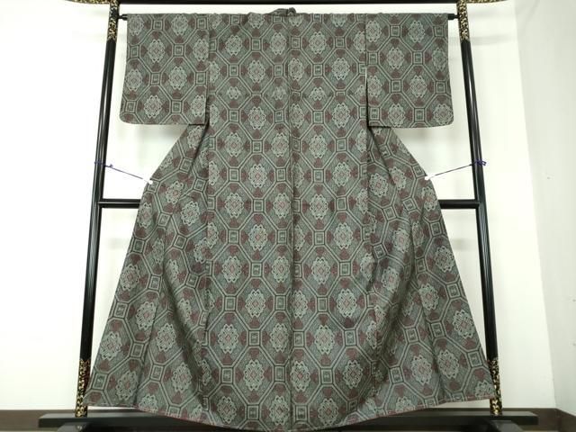 平和屋着物○本場大島紬 割り込み絣 蜀江花文 正絹 逸品 未使用  