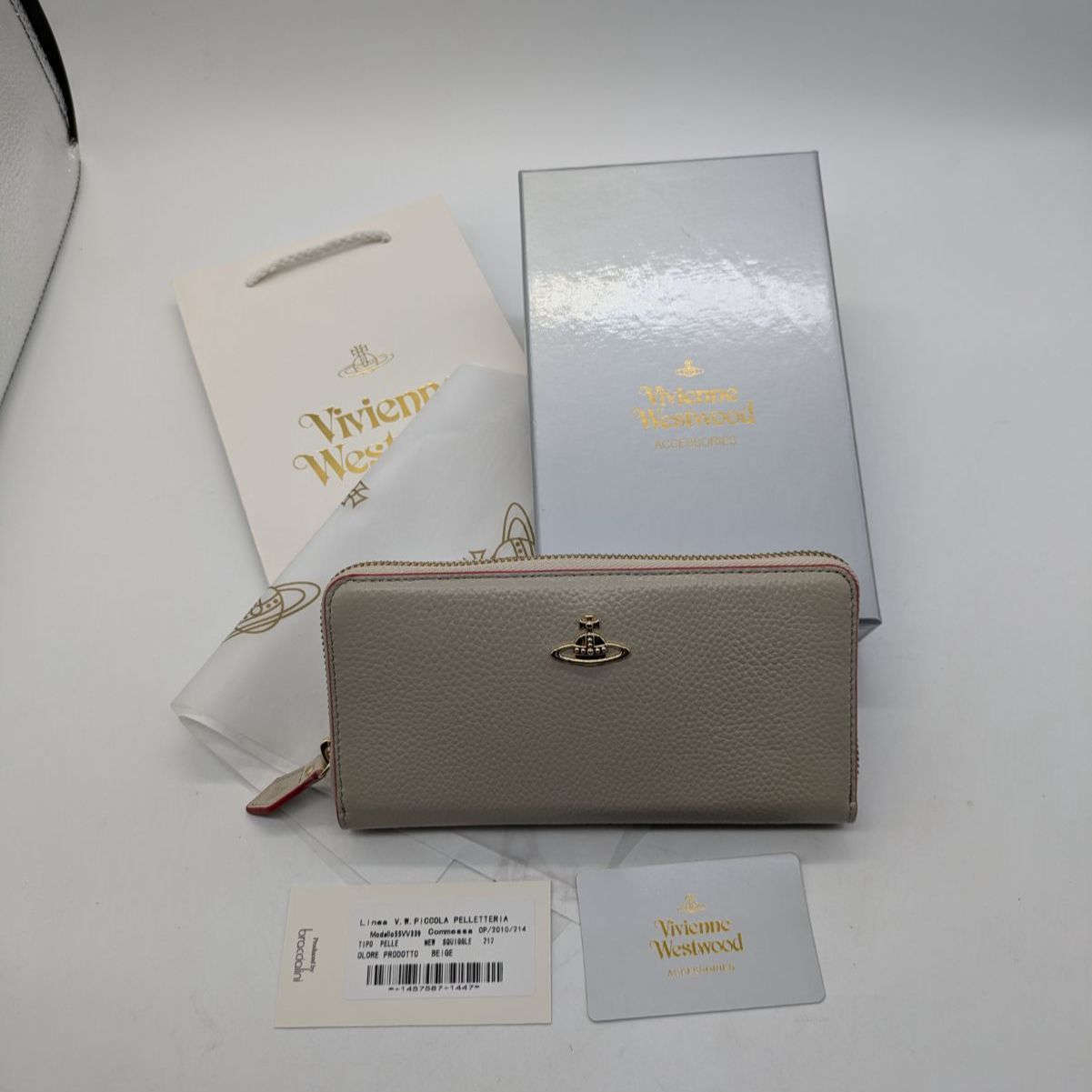 新品未使用】VivienneWestwood 長財布 ベージュ - メルカリ