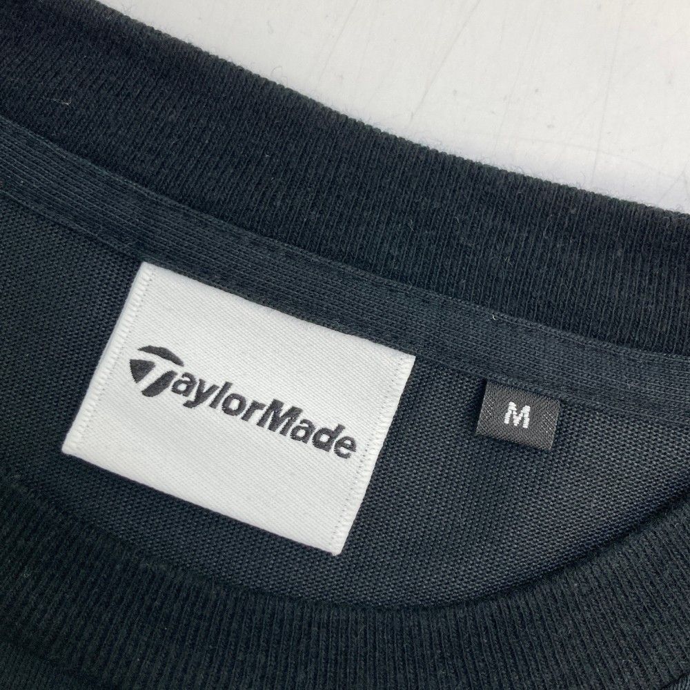 サイズ：M TAYLOR MADE テーラーメイド 2024年 半袖Tシャツ  ブラック系 [240101447307] ゴルフウェア メンズ ストスト サイズ：M TAYLOR MADE テーラーメイド 2024年 半袖Tシャツ