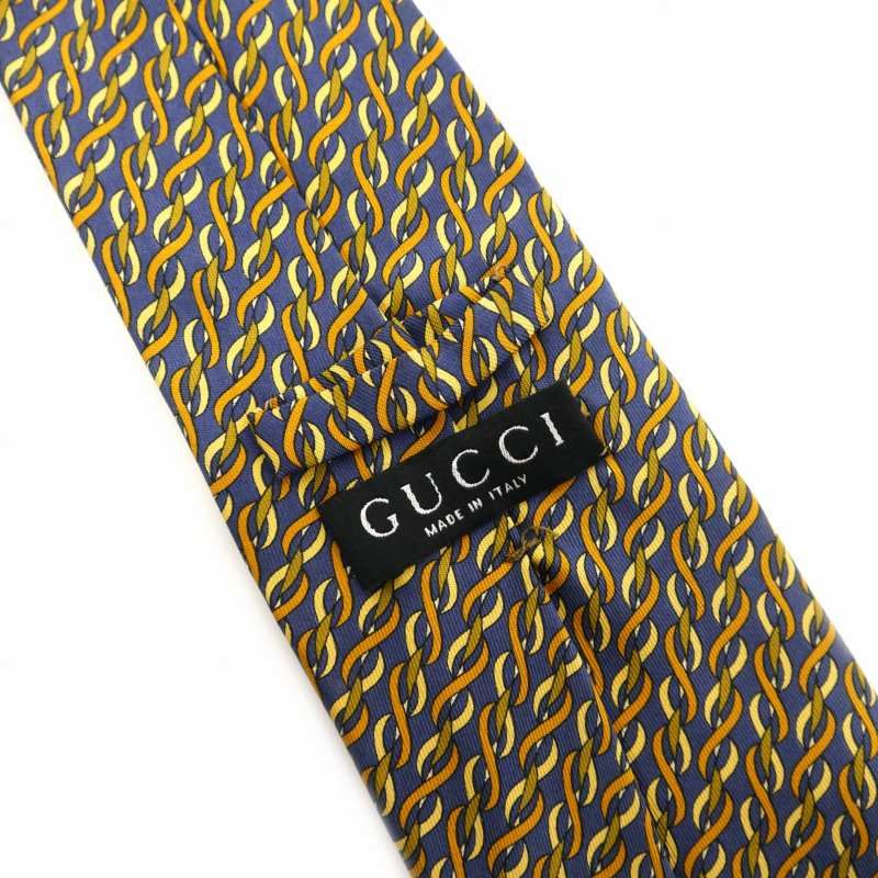美品 GUCCI ネクタイ シルク100% ネイビー イエロー 総柄 美品 GUCCI グッチ ネクタイ シルク100％ ネイビー ブルー 総柄