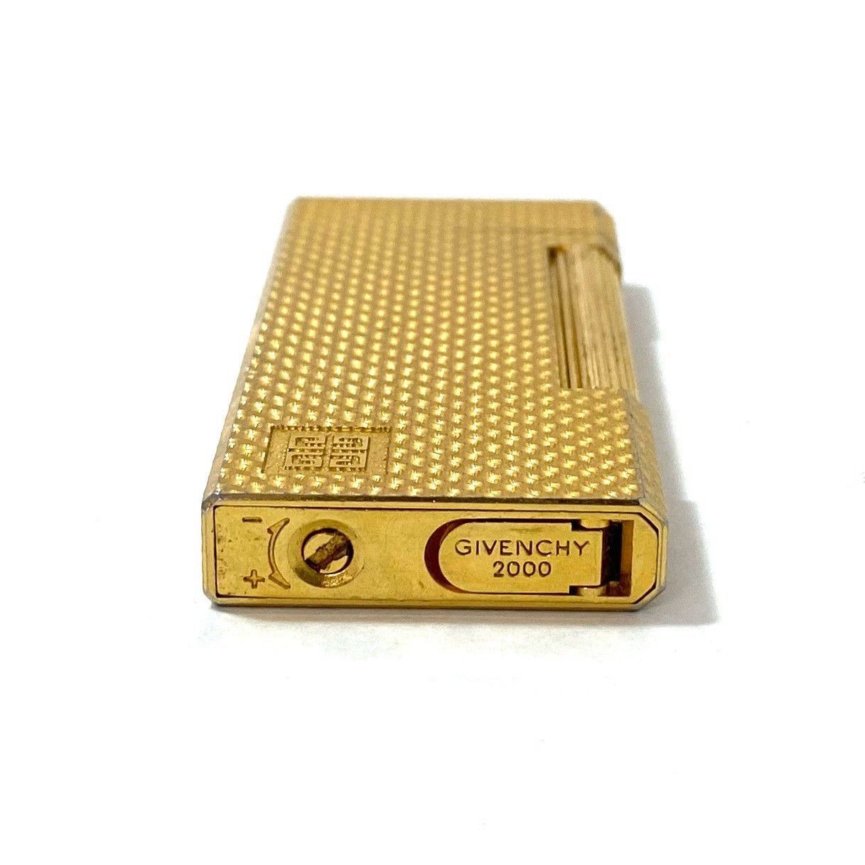 GIVENCHY - ジバンシィ 2000 ガスライター ローラー式 総柄 ロゴ ゴールドカラー GIVENCHY】2000 ローラー式 ガスライター ロゴ ゴールド/金