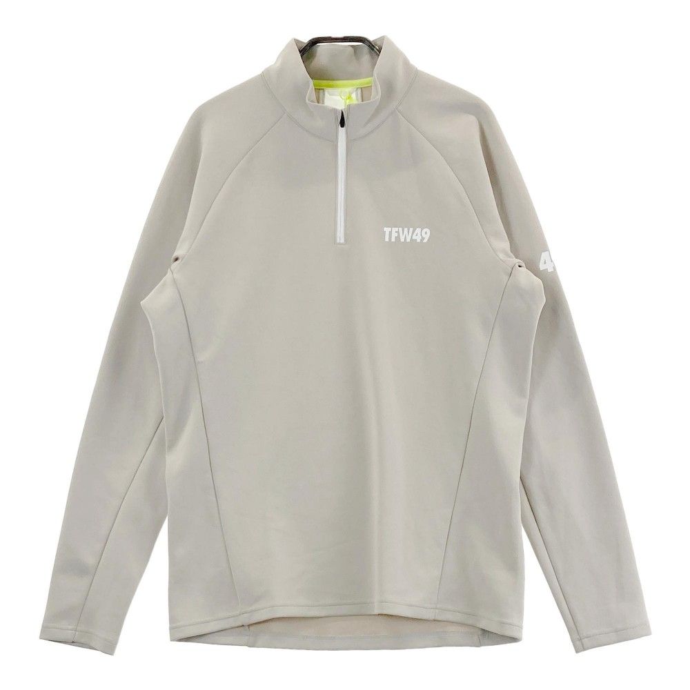 サイズ：L TFW49 ティーエフダブリューフォーティーナイン T102320008 長袖ハーフジップTシャツ  ベージュ系 [240101373206] ゴルフウェア メンズ ストスト junhashimoto 【TFW49/ティーエフダブリュー フォーティーナイン