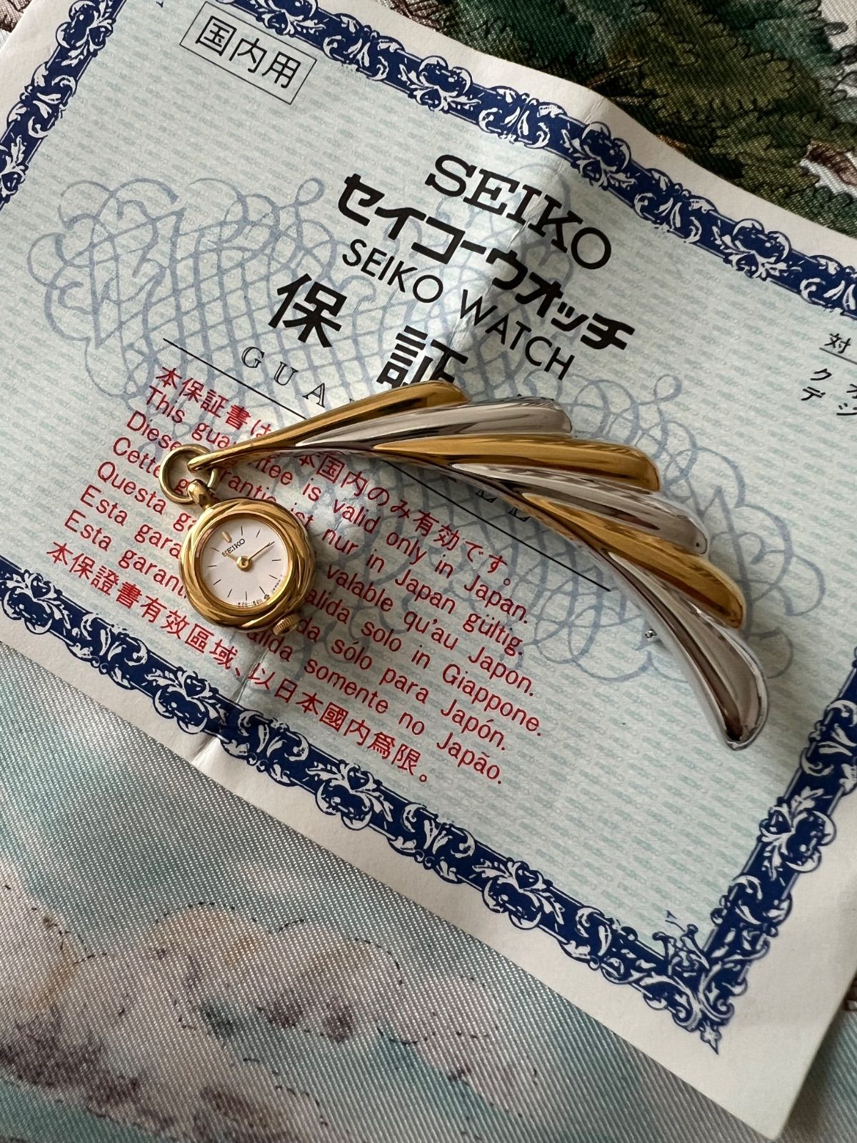 セイコー ブローチ時計 1E20-0480 クオーツ 羽のデザイン