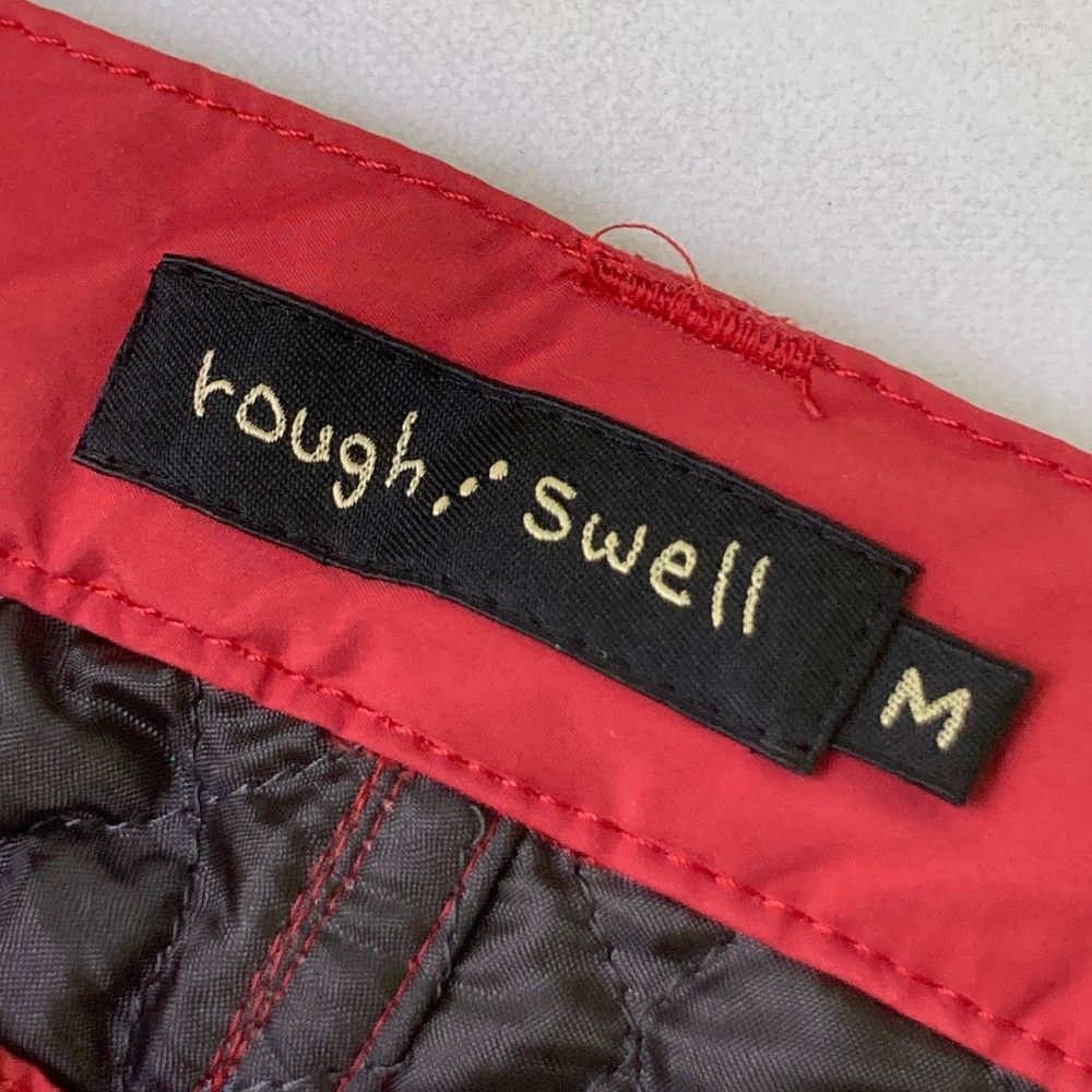 サイズ：M ROUGH&SWELL ラフアンドスウェル  中綿パンツ  レッド系 [240101412548] ゴルフウェア メンズ ストスト サイズ：M ROUGH&SWELL ラフアンドスウェル 中綿パンツ レッド系