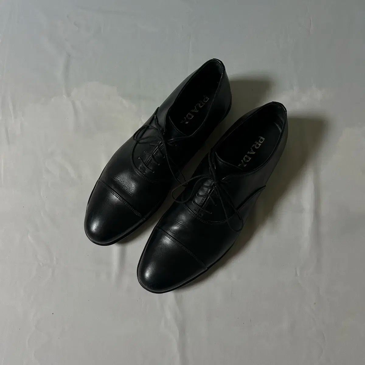 Prada sports cap toe derby shoes