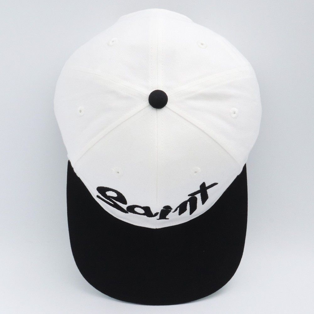 SAINT ロゴ キャップ ホワイト/ブラック SAINT Mxxxxxx SAINT JOURNEY Cap Black _ FASCINATE Osaka