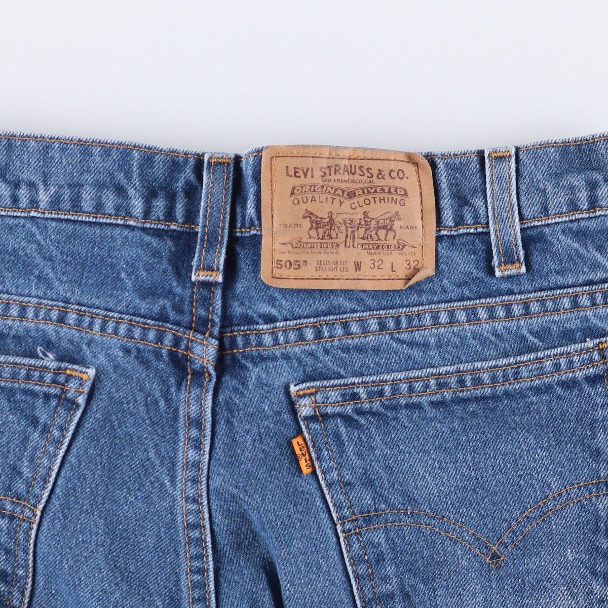 テーパードデニムパンツ