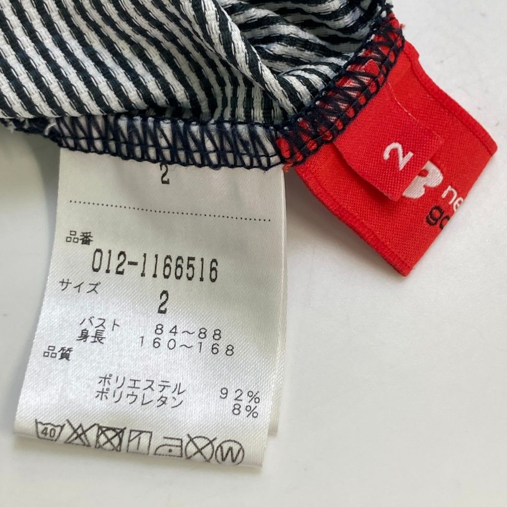 サイズ：2 NEW BALANCE GOLF ニューバランス  ハイネック 半袖Tシャツ 袖フレア 総柄 ブラック系 [240101438968] ゴルフウェア レディース ストスト サイズ：2 NEW BALANCE GOLF ニューバランス ハイネック 半袖T