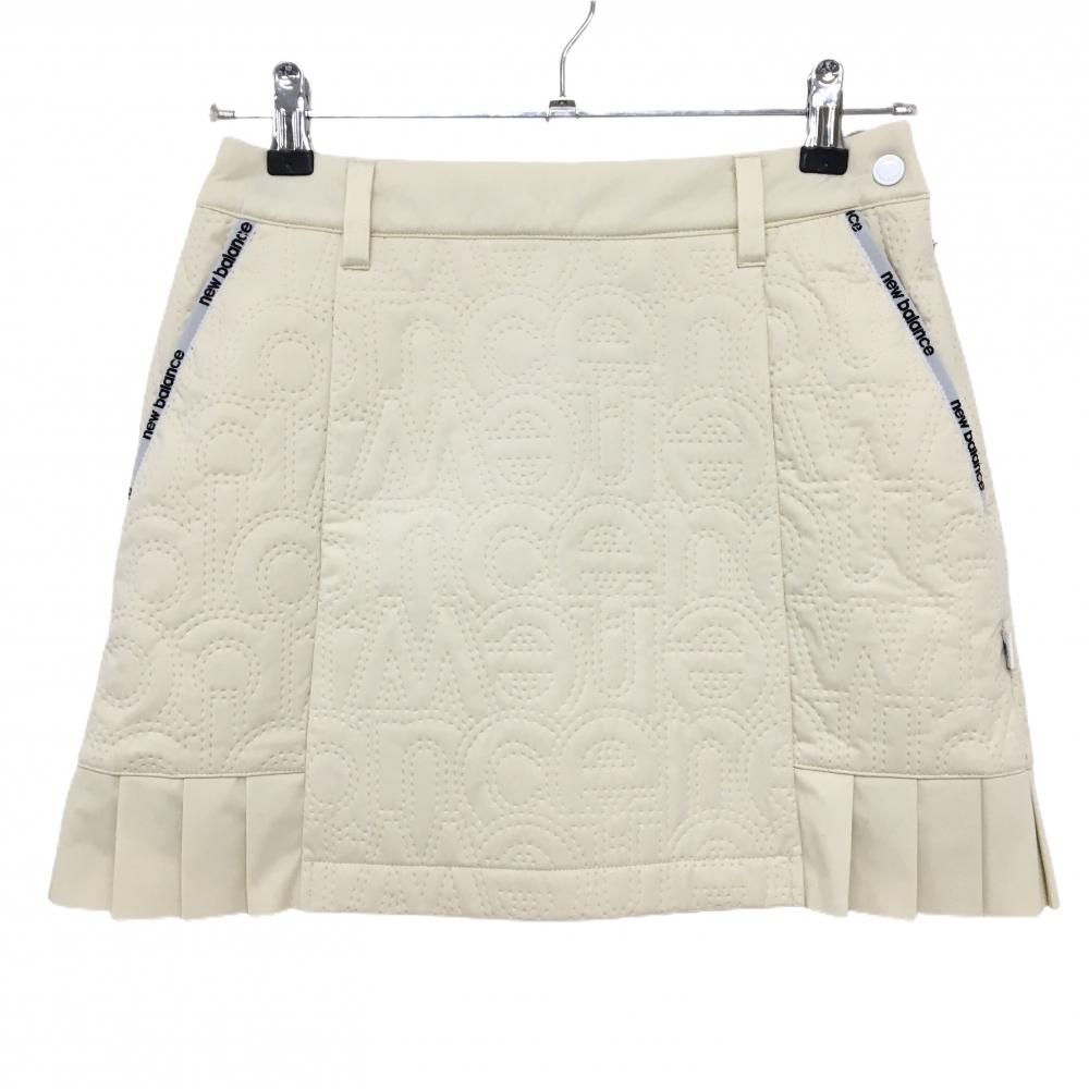 【超美品】ニューバランスゴルフ スカート アイボリー エンボスロゴ総柄 レディース 0(S) ゴルフウェア 2024年モデル New Balance