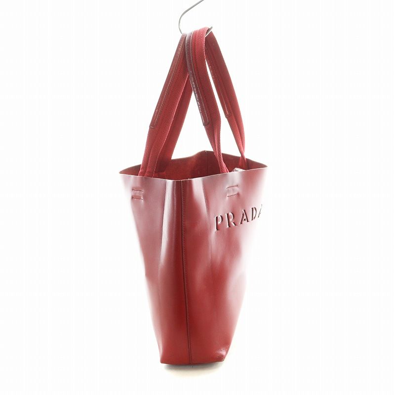 プラダ ハンドバッグ　レッド プラダ PRADA トートバッグ ハンド レザー パンチング ロゴ ポーチ付き