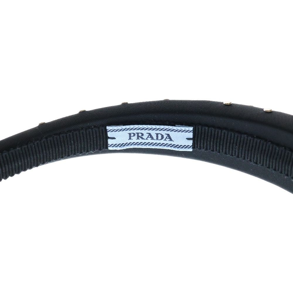 PRADA (プラダ) トライアングルプレートロゴ スタッズ カチューシャ  