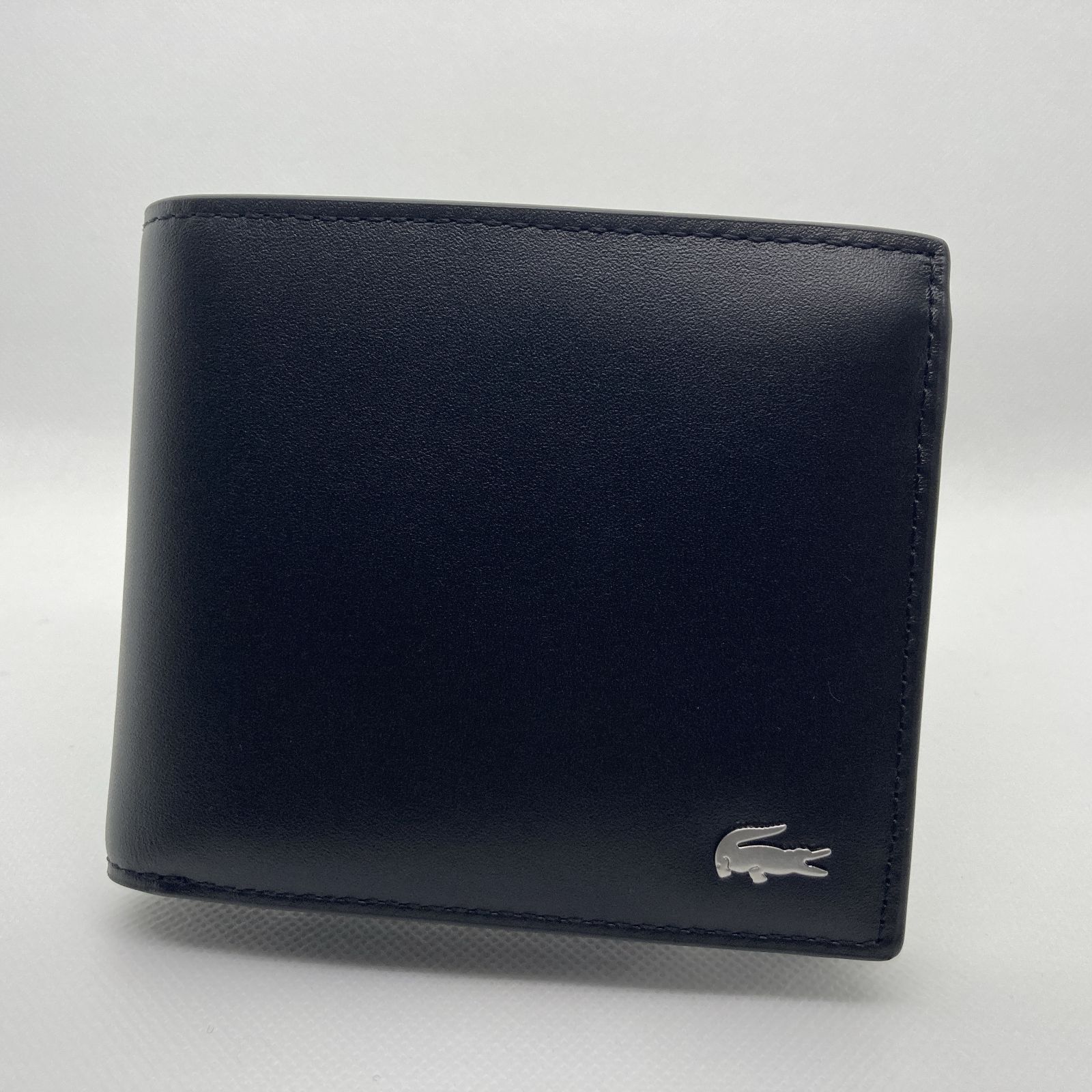 LACOSTE 財布 シュリンクカウレザー ジップコインポケット付き