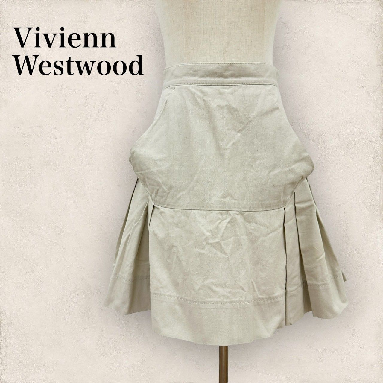 美品】Vivienn Westwood ヴィヴィアンウエストウッド ギャザー チノフリルスカート サイズ1 ベージュ 202408-0390 -  メルカリ