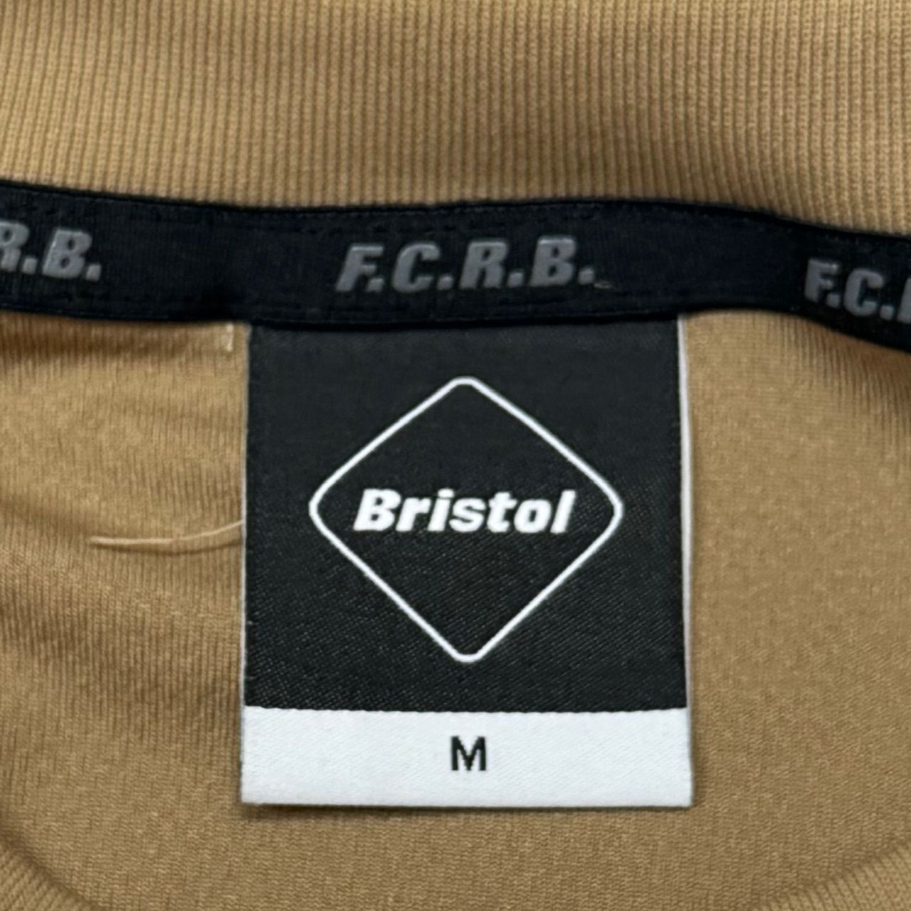 新品・在庫品 F.C.R.B. STRADDLE LOGO S/S TOUR TEE 黒L 【公式通販】