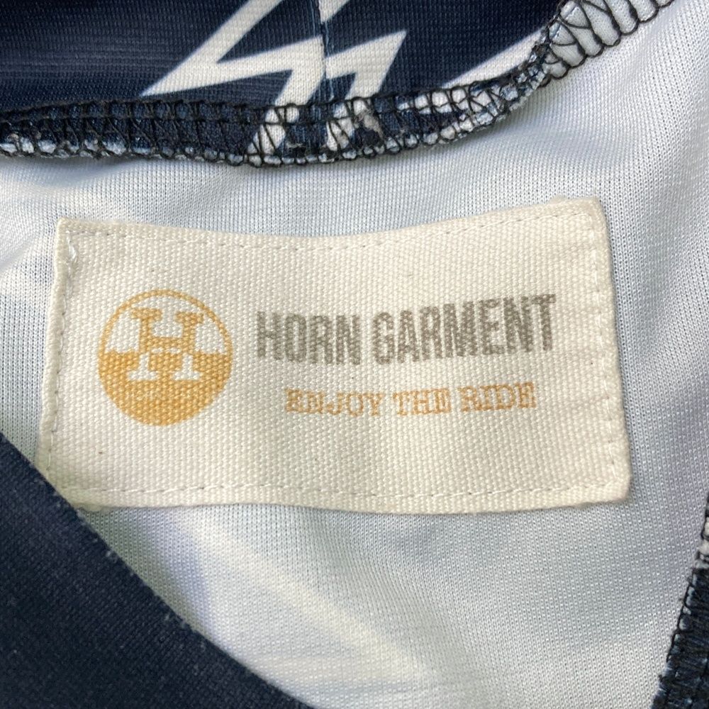 サイズ：48 HORN GMT ホーン ガーメント ×Grateful Dead ハイネック 半袖Tシャツ 総柄 ネイビー系 [240101477076] ゴルフウェア メンズ ストスト サイズ：48 HORN GMT ホーン ガーメント ×Grateful Dead