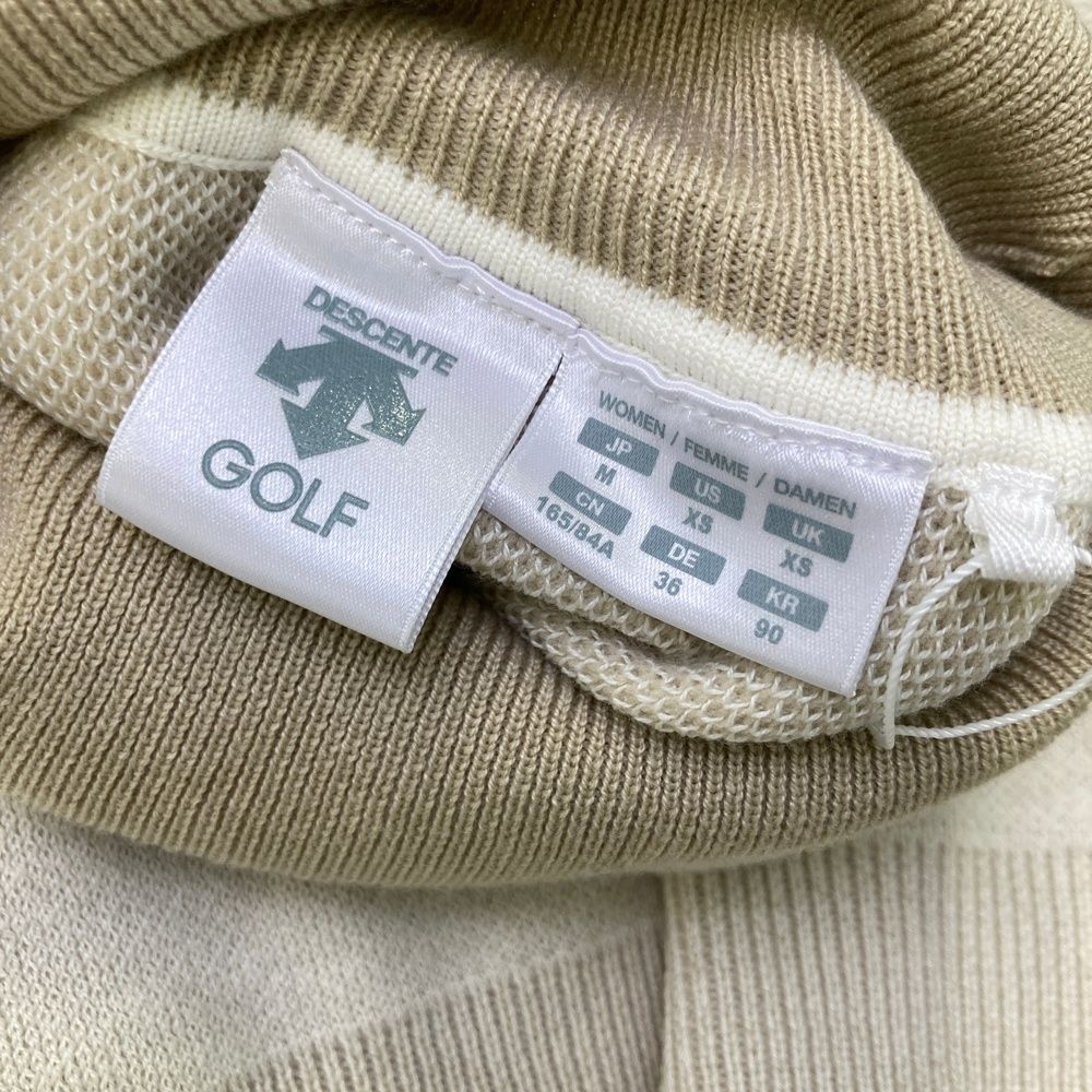 品質100％！ サイズ M DESCENTE GOLF デサントゴルフ DGWUJL10 ウール混 タートルネック ニットセーター ベージュ系 240101530195 ゴルフウェア レディース ストスト