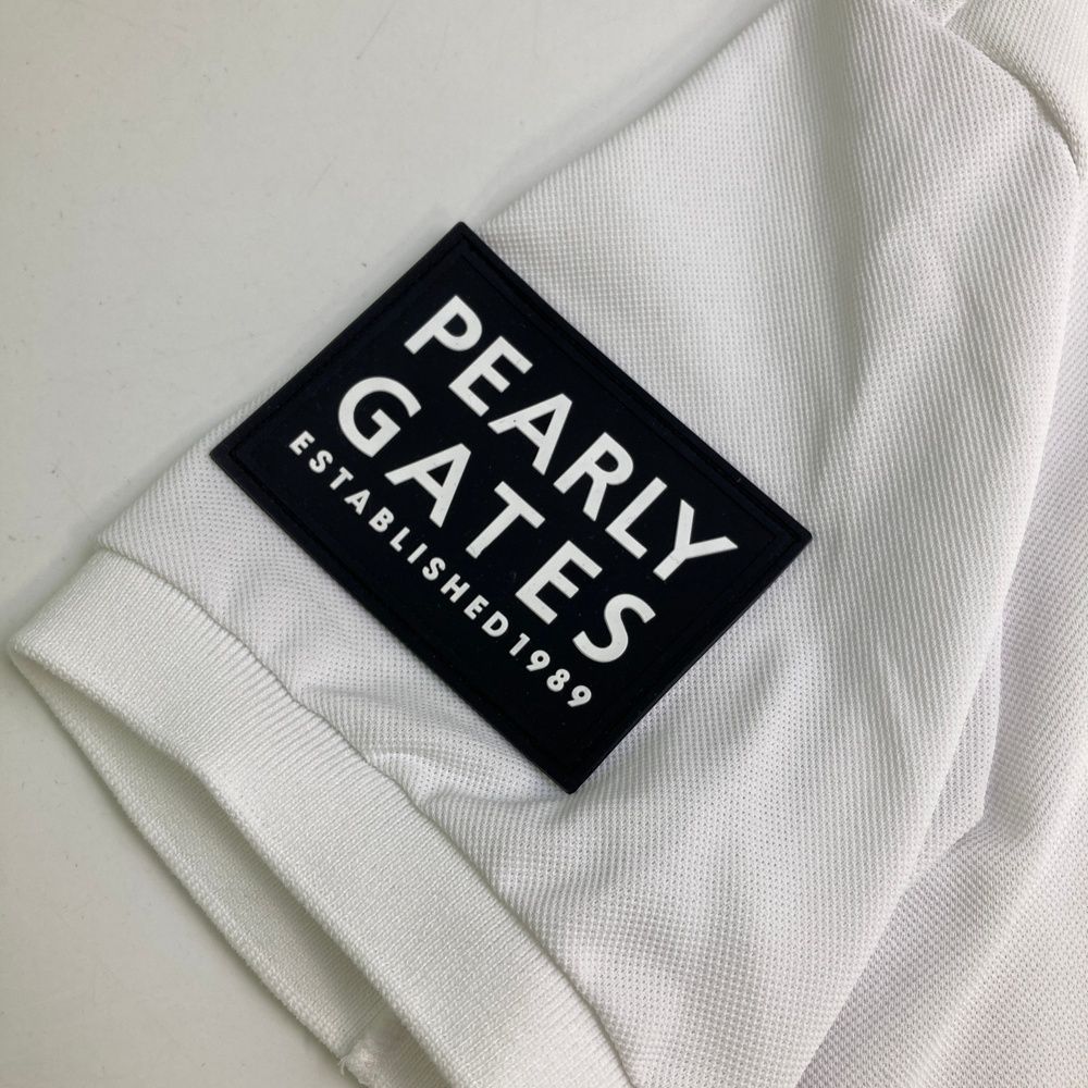 サイズ：6 PEARLY GATES パーリーゲイツ 2023年モデル 半袖ポロシャツ 千鳥柄 ホワイト系 [240101435760] ゴルフウェア メンズ ストスト PEARLY GATES パーリーゲイツ 2023年モデル 半袖ポロシャツ 千鳥
