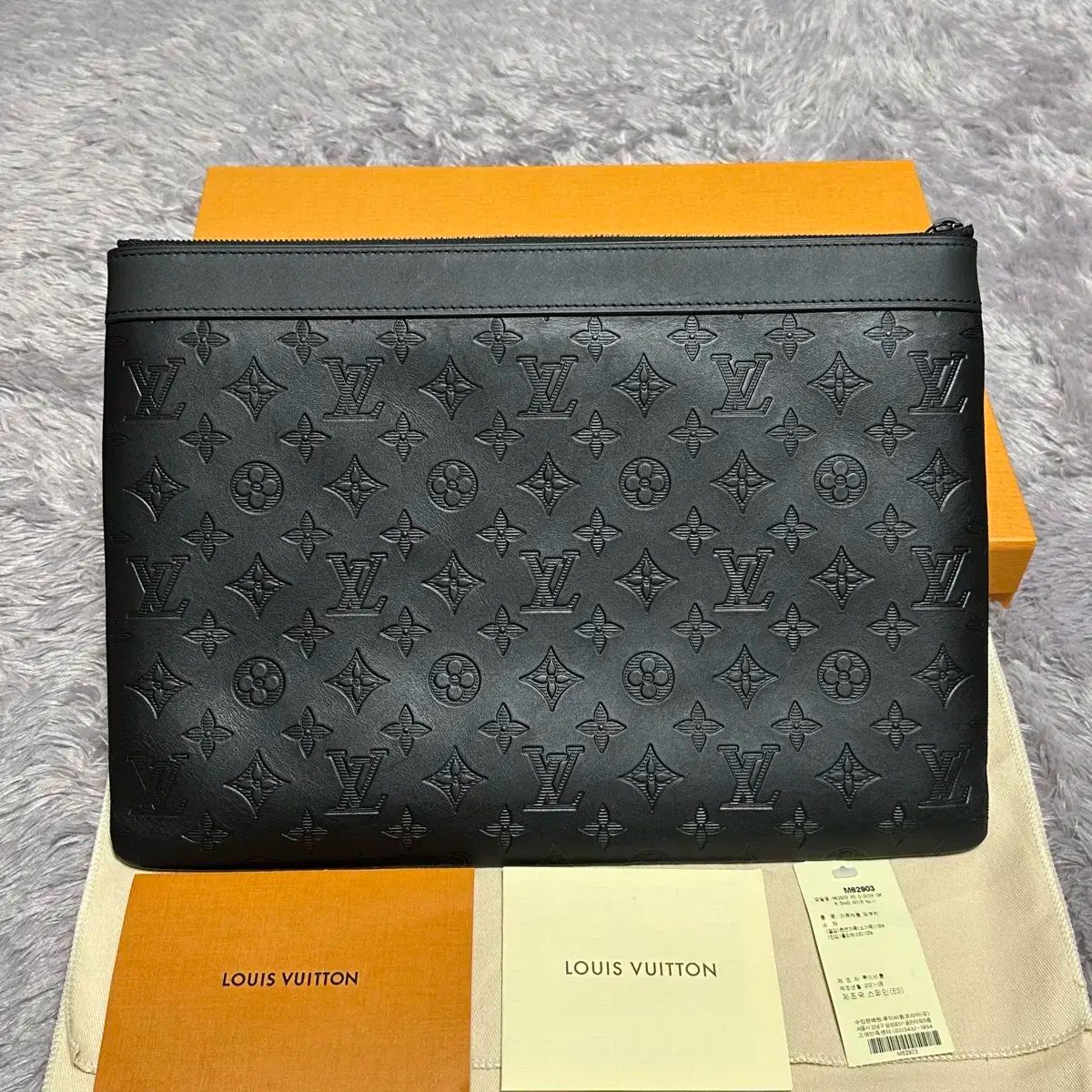 DISCOVERY クラッチバッグ