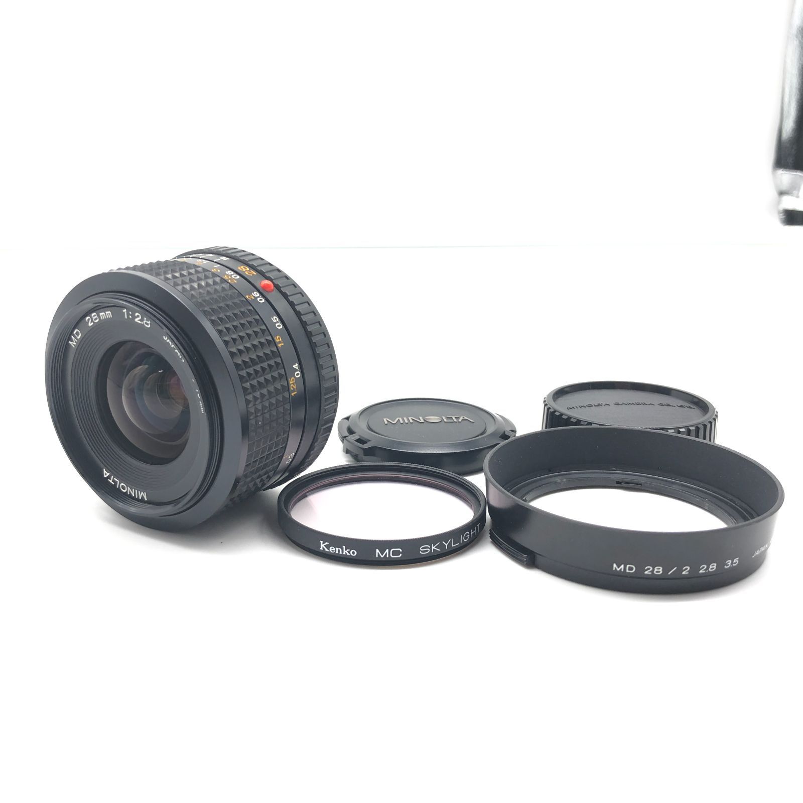 美品】 ミノルタ New MD 28mm F2.8 フードつき 広角 単焦点 美品】 ミノルタ New MD 28mm F2.8 フードつき 広角 単焦点
