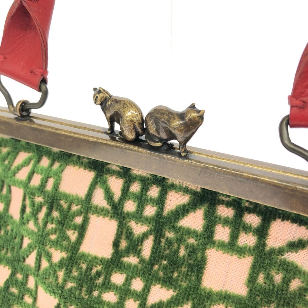 ミナペルホネン　がま口ハンドバッグ 猫留め金付き mina perhonen ミナペルホネン ハンドバッグ がま口/ネコつまみ