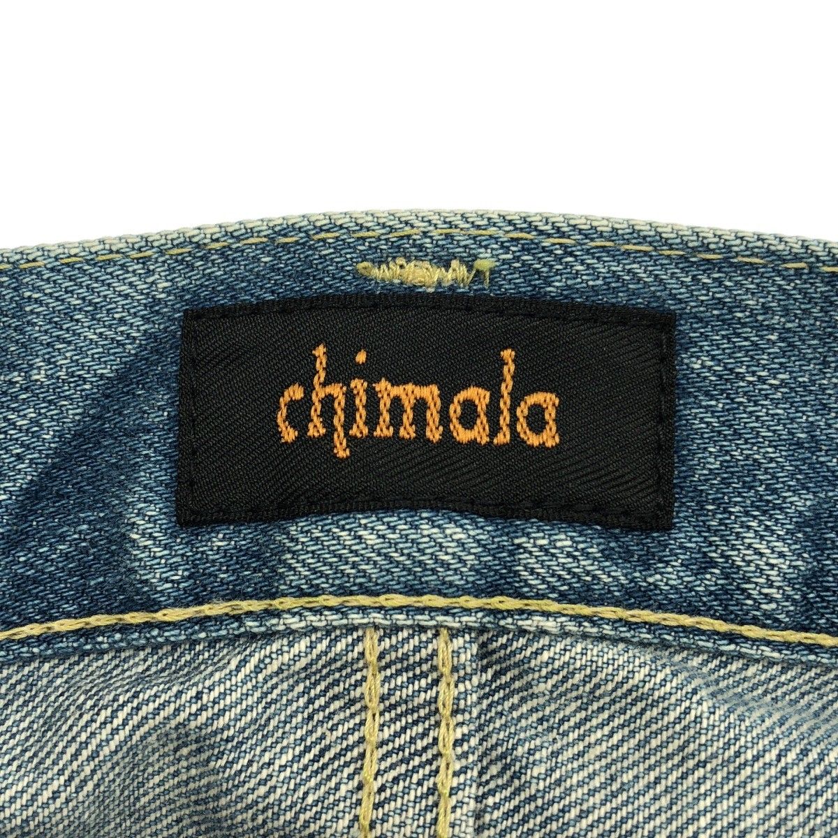 ヴィンテージ加工デニムパンツ