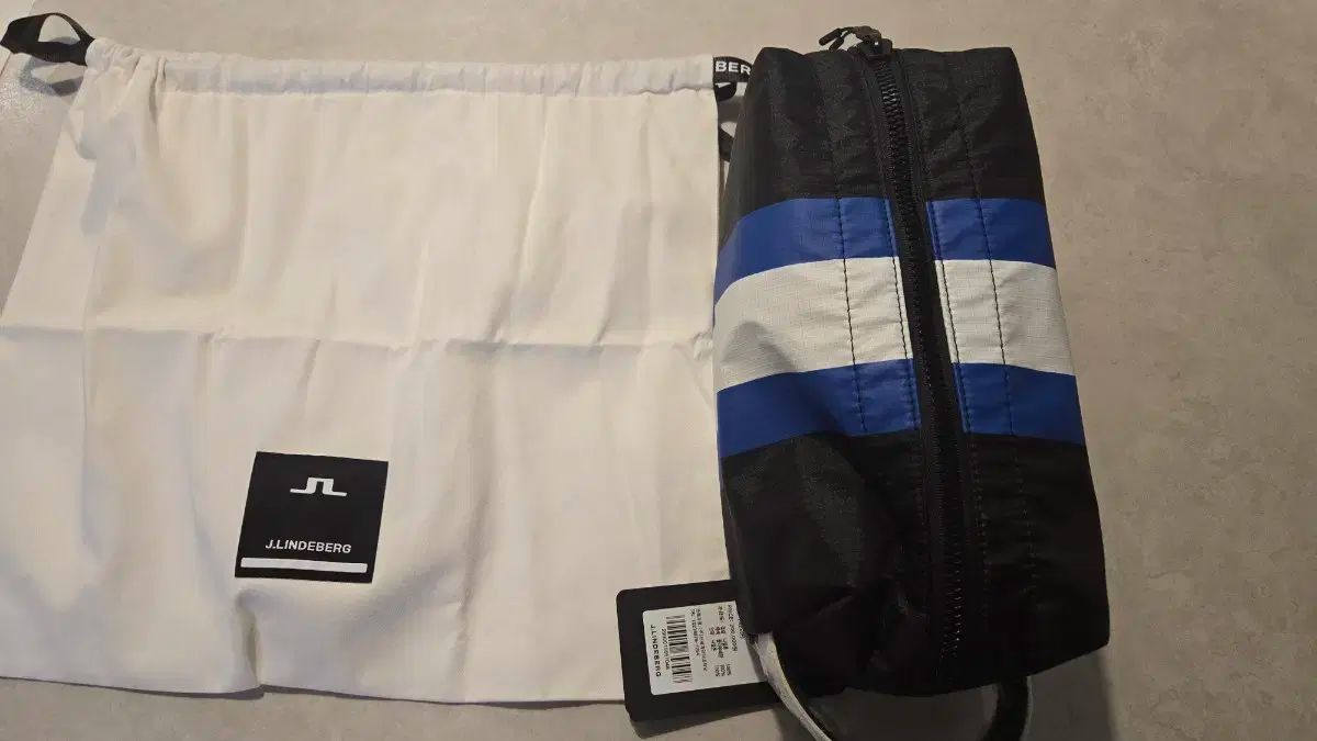 J Lindeberg キーア ポーチ ブラック ポップ