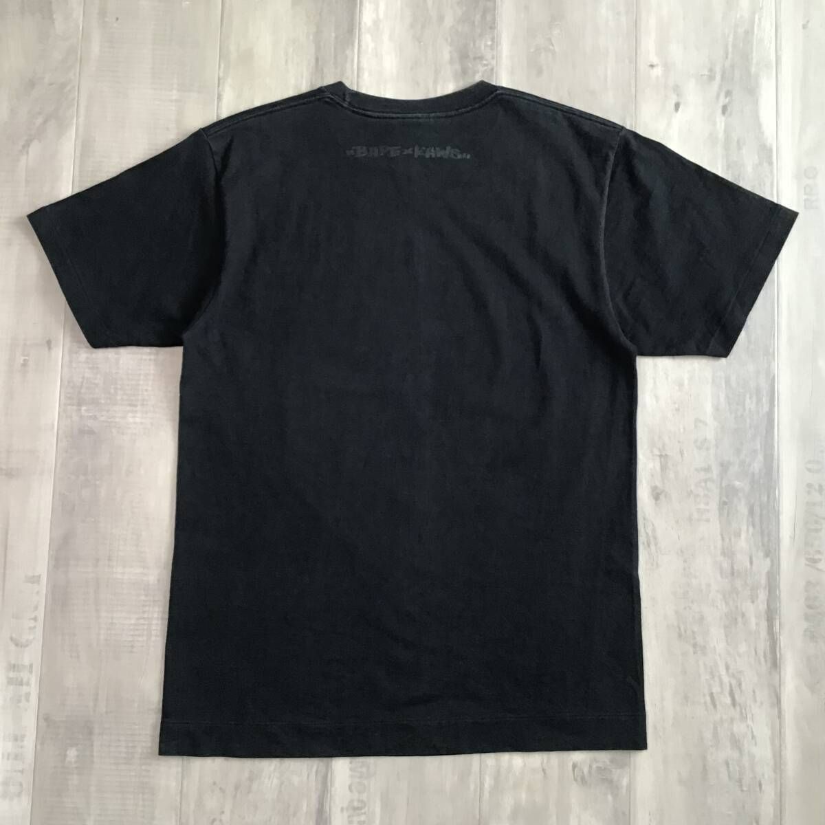 APE BAPE KAWS LA 限定ゲームシャツCAMO tシャツL