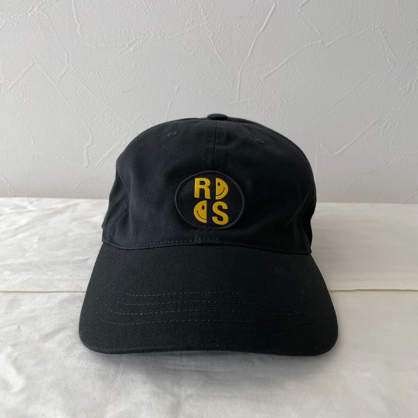 新品】RAF SIMONS（ラフシモンズ）SMILEY LOGO CAP - メルカリ