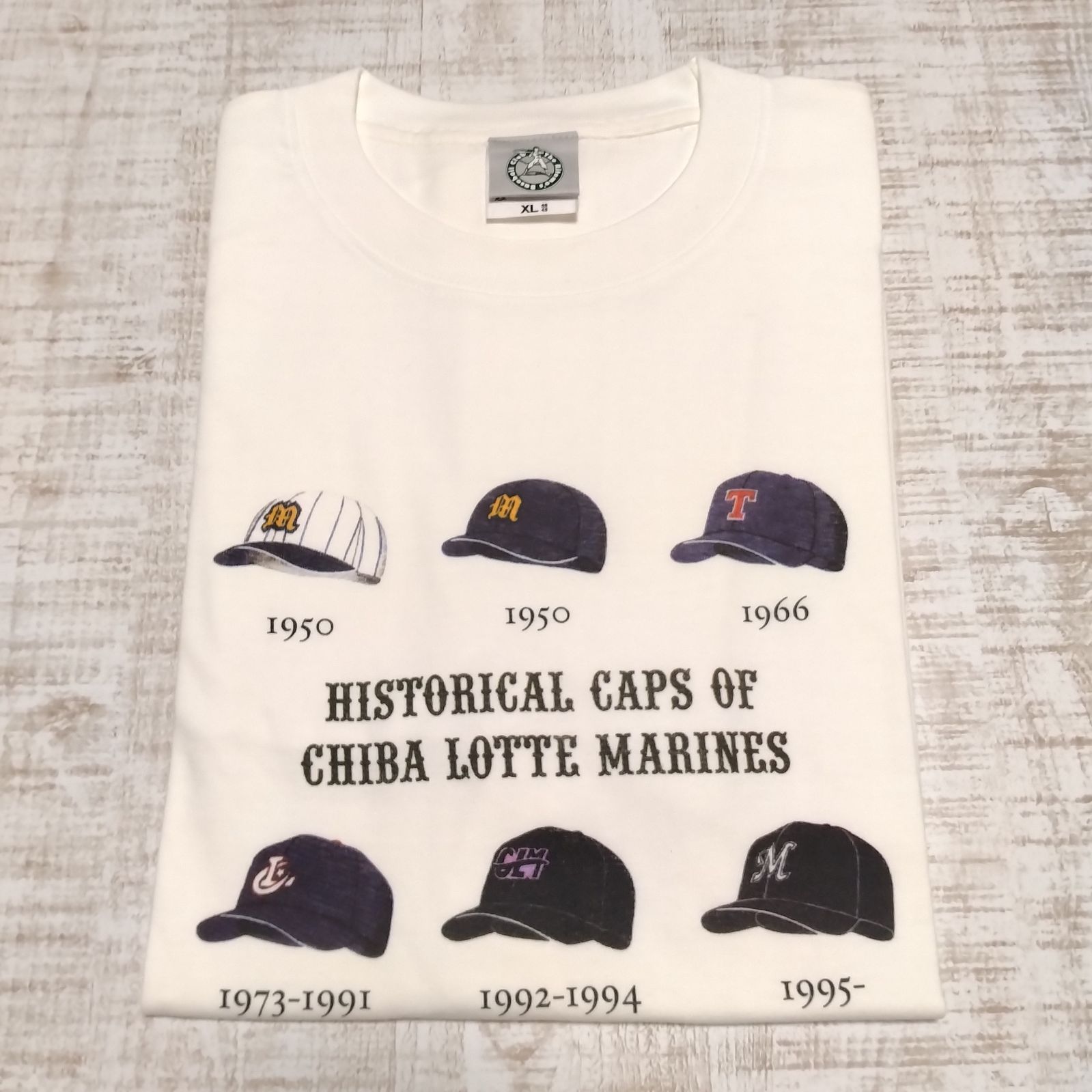 新品 球団承認 ロッテオリオンズ 千葉ロッテマリーンズ ヒストリカルキャップ Tシャツ 白 XLサイズ The Ritomos Baseball  club - メルカリ