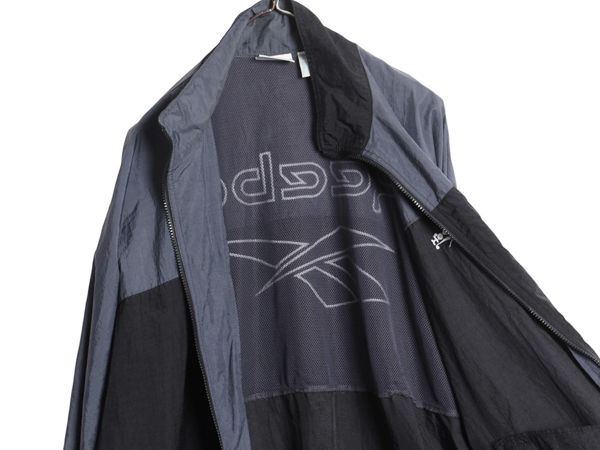 なクーポン配布中! 90s リーボック フルジップ ナイロン トラック ジャケット メンズ L 古着 ウインドブレーカー ジャンパー ビッグ ロゴ刺繍 黒 灰 KANDAIZUMI_COM