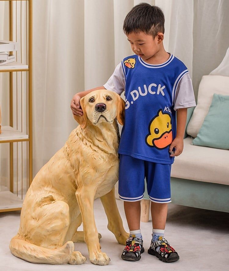 値下げいたします少年と犬の置き物