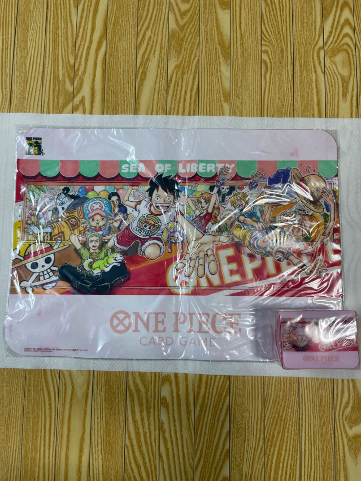 ONE PIECE 新品未開封 ワンピース Meet the ONE PIECE25周年 プレイマット&クリアカードケース - メルカリ