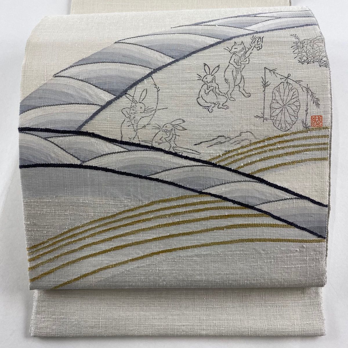 袋帯 美品 名品 佐伯武晴 落款 手彫木版染 鳥獣戯画 波 灰白 お太鼓柄