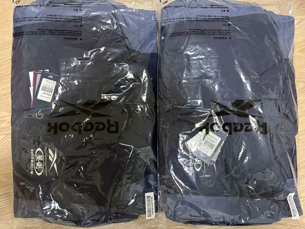 圧倒 Reebok コラボ モデル 軽量ダウン ALLRIGHT BORN TO WIN DOM