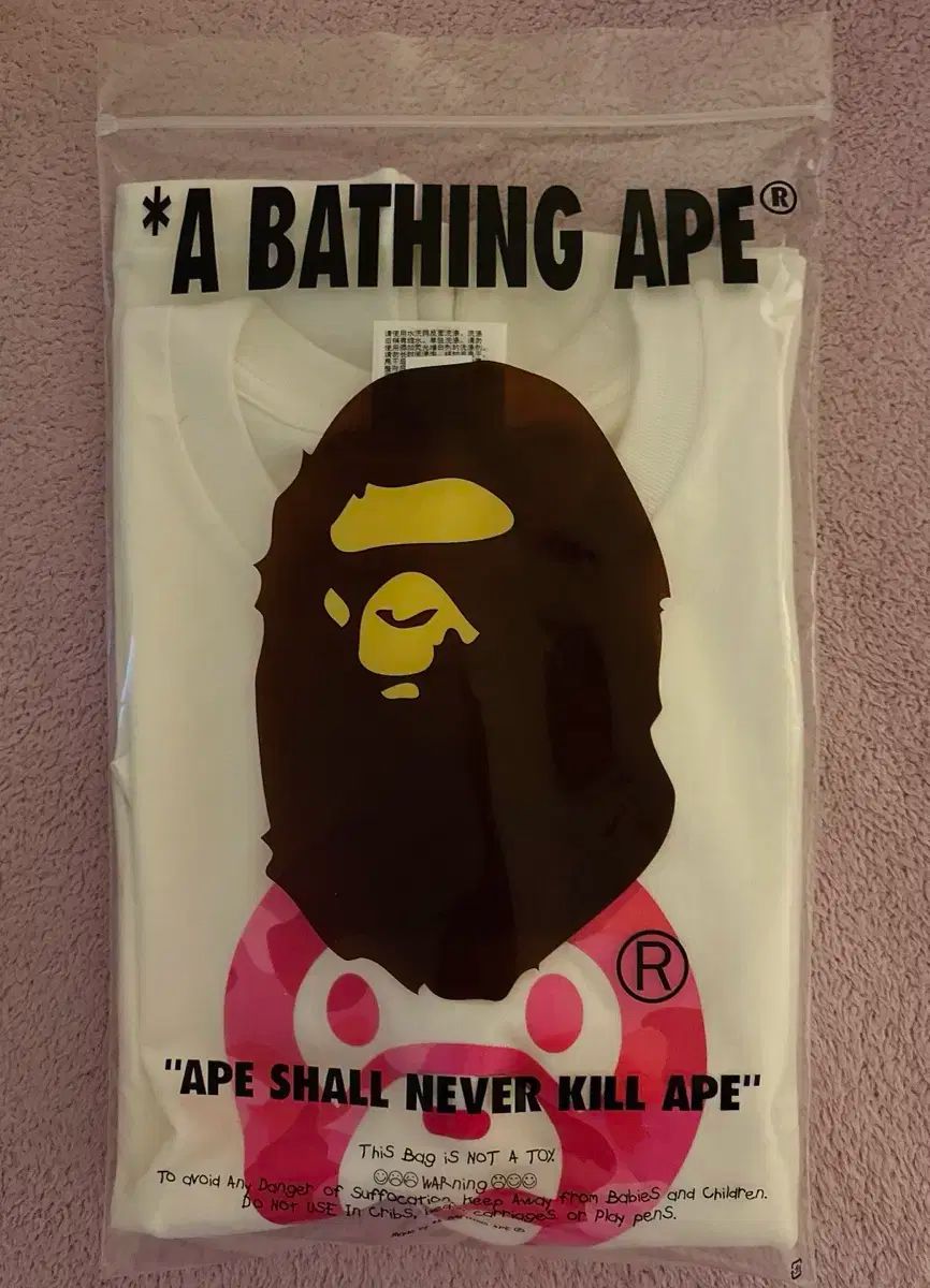 A BATHING APE アベイシングエイプ ベイビーマイロ 半袖 ピンク xsサイズ