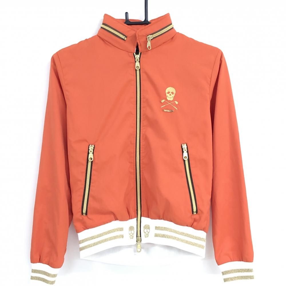 超 マークアンドロナ ジャケット オレンジ 裾ロゴ スカル メッシュ裏地 フード収納可 レディース ゴルフウェア MARK＆LONA