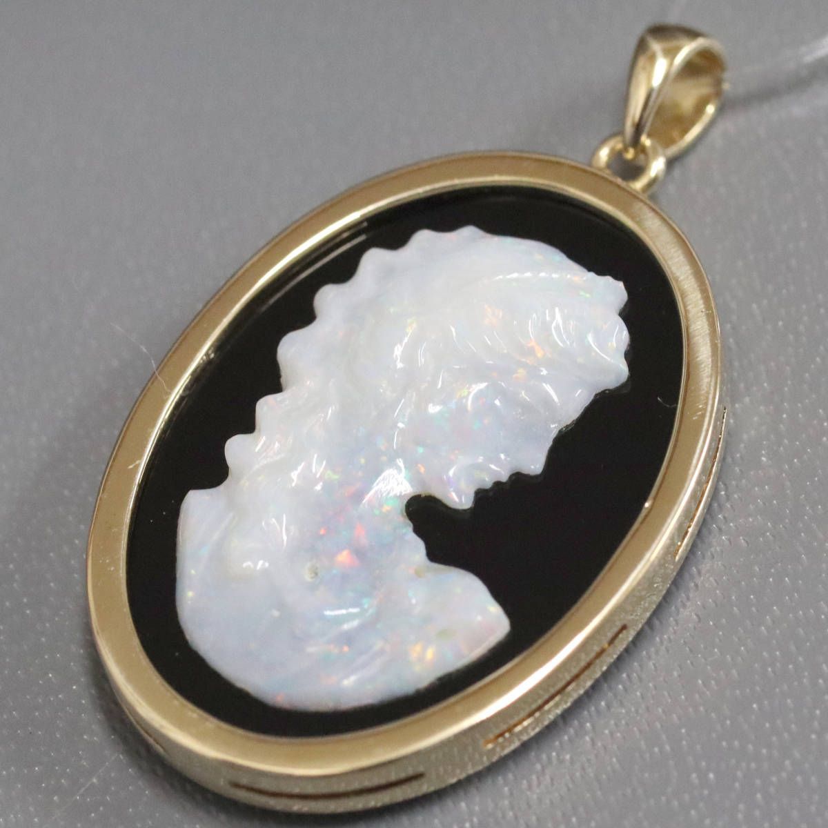 K18オニキスオパールペンダントトップ 6.2g - メルカリ