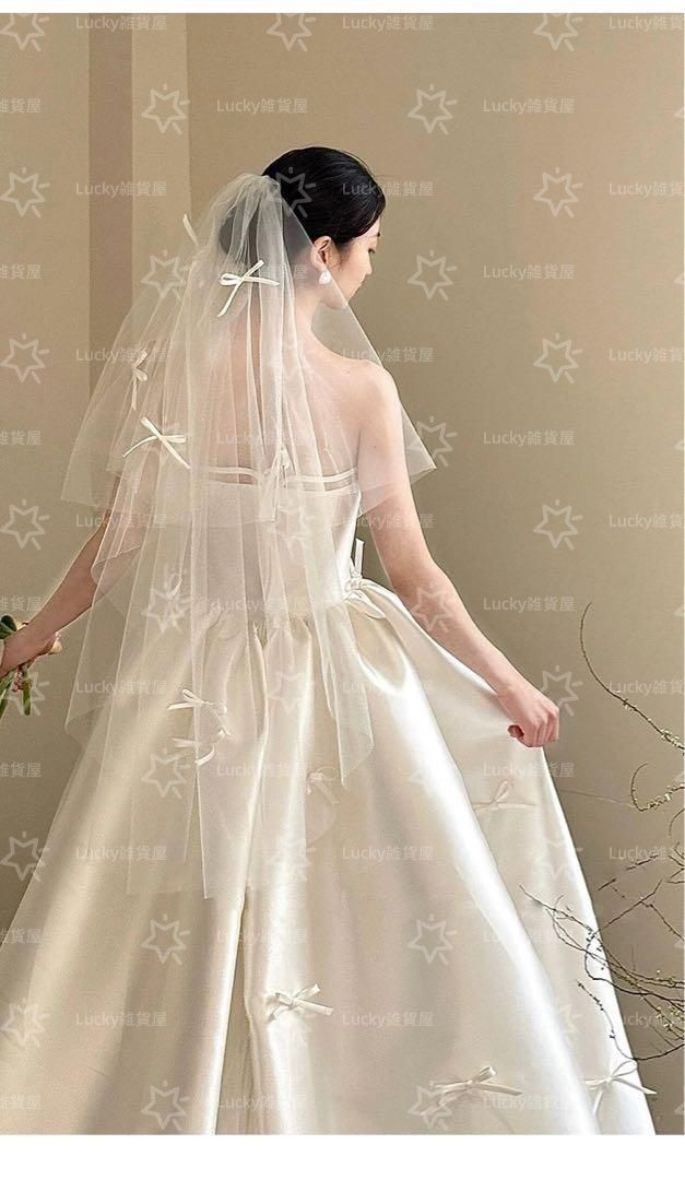 フェミニンリボンドレス✨結婚式に華を添える　ワンポイントデザイン　デコルテ 新品・未使用】 レディースファッション 人気商品 フェミニン